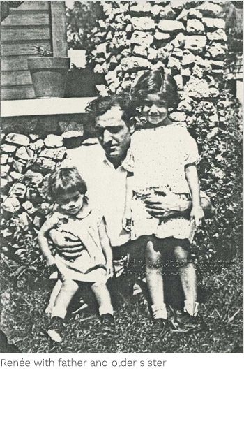 A man and two children pose for the camera.